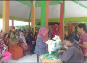 Warga Puger Wetan Terima Bantuan Beras dari Pemerintah
