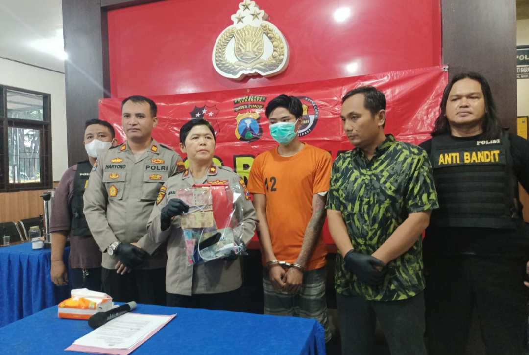 Dua tersangka