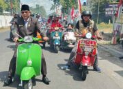 Usai Dilantik, Stack Ponco Gati Pulang Naik Vespa Diiringi Ratusan Pendukung