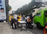 Jelang Debat, Tim Pemenangan GURU Berbagi Ribuan Nasi Kotak di Jumat Berkah