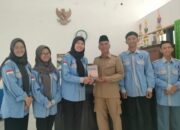 Sinergi Literasi: SMK Mulu Sumbang Buku Lokal Content ke Perpus Mulamarung
