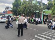 Satlantas Polres Madiun Kota Amankan Kedatangan dan Kepulangan Siswa Sekolah